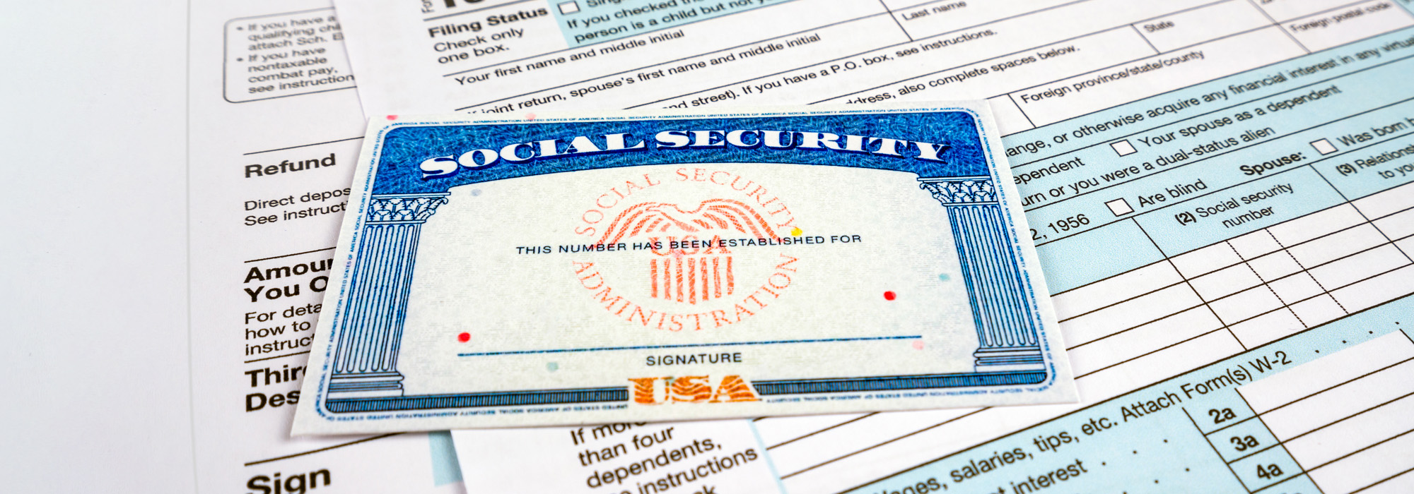 blank social security card and 1040 us individual tax income return form