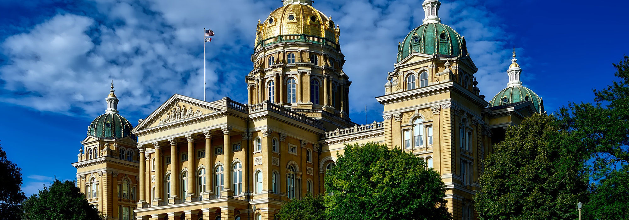 Iowa State Capitol building in Des Moines on a sunny summer afternoon